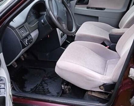 Красный ВАЗ 2170 Priora, объемом двигателя 1.6 л и пробегом 238 тыс. км за 1799 $, фото 13 на Automoto.ua