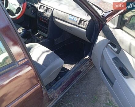 Красный ВАЗ 2170 Priora, объемом двигателя 1.6 л и пробегом 205 тыс. км за 2200 $, фото 9 на Automoto.ua