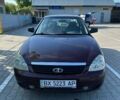 Красный ВАЗ 2170 Priora, объемом двигателя 1.6 л и пробегом 165 тыс. км за 2200 $, фото 1 на Automoto.ua
