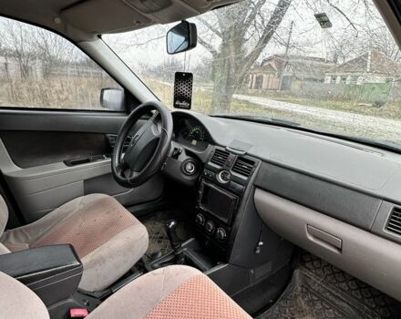 Красный ВАЗ 2170 Priora, объемом двигателя 1.6 л и пробегом 146 тыс. км за 2000 $, фото 6 на Automoto.ua