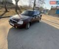 Красный ВАЗ 2170 Priora, объемом двигателя 1.6 л и пробегом 310 тыс. км за 2100 $, фото 1 на Automoto.ua
