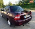Красный ВАЗ 2170 Priora, объемом двигателя 1.6 л и пробегом 200 тыс. км за 3000 $, фото 1 на Automoto.ua