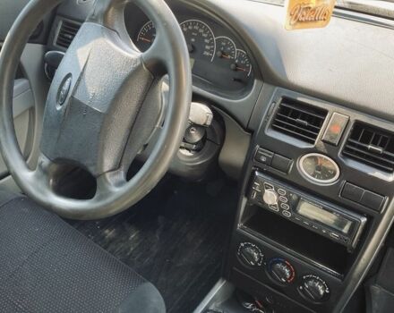 Красный ВАЗ 2170 Priora, объемом двигателя 1.6 л и пробегом 160 тыс. км за 1400 $, фото 5 на Automoto.ua