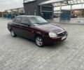 Красный ВАЗ 2170 Priora, объемом двигателя 1.6 л и пробегом 330 тыс. км за 2108 $, фото 1 на Automoto.ua
