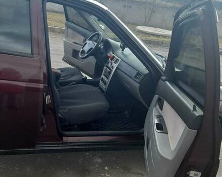 Красный ВАЗ 2170 Priora, объемом двигателя 1.6 л и пробегом 207 тыс. км за 2600 $, фото 7 на Automoto.ua