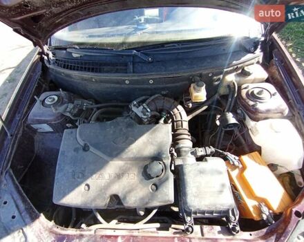 Красный ВАЗ 2170 Priora, объемом двигателя 1.6 л и пробегом 205 тыс. км за 2200 $, фото 6 на Automoto.ua