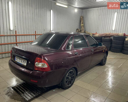 Красный ВАЗ 2170 Priora, объемом двигателя 1.6 л и пробегом 202 тыс. км за 1555 $, фото 1 на Automoto.ua