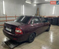 Красный ВАЗ 2170 Priora, объемом двигателя 1.6 л и пробегом 202 тыс. км за 1555 $, фото 1 на Automoto.ua