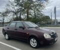 Красный ВАЗ 2170 Priora, объемом двигателя 1.6 л и пробегом 142 тыс. км за 2200 $, фото 1 на Automoto.ua