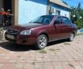 Красный ВАЗ 2170 Priora, объемом двигателя 1 л и пробегом 130 тыс. км за 2300 $, фото 1 на Automoto.ua