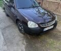 Красный ВАЗ 2170 Priora, объемом двигателя 1.6 л и пробегом 300 тыс. км за 1850 $, фото 1 на Automoto.ua