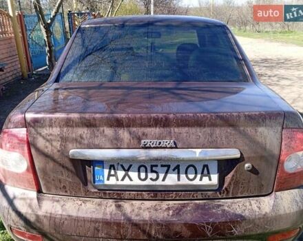 Красный ВАЗ 2170 Priora, объемом двигателя 1.6 л и пробегом 205 тыс. км за 2200 $, фото 1 на Automoto.ua