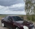 Красный ВАЗ 2170 Priora, объемом двигателя 1.6 л и пробегом 202 тыс. км за 1600 $, фото 1 на Automoto.ua