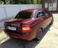 Красный ВАЗ 2170 Priora, объемом двигателя 1.6 л и пробегом 175 тыс. км за 2750 $, фото 4 на Automoto.ua