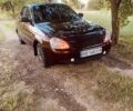 Красный ВАЗ 2170 Priora, объемом двигателя 1.6 л и пробегом 221 тыс. км за 2500 $, фото 1 на Automoto.ua