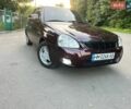 Красный ВАЗ 2170 Priora, объемом двигателя 1.6 л и пробегом 128 тыс. км за 3400 $, фото 1 на Automoto.ua
