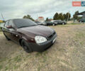 Красный ВАЗ 2170 Priora, объемом двигателя 1.6 л и пробегом 100 тыс. км за 1850 $, фото 1 на Automoto.ua