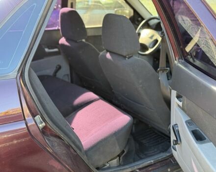 Червоний ВАЗ 2170 Priora, об'ємом двигуна 1.6 л та пробігом 160 тис. км за 1700 $, фото 10 на Automoto.ua