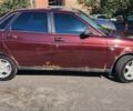 Червоний ВАЗ 2170 Priora, об'ємом двигуна 1.6 л та пробігом 115 тис. км за 2300 $, фото 1 на Automoto.ua