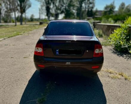 Красный ВАЗ 2170 Priora, объемом двигателя 1.6 л и пробегом 176 тыс. км за 3500 $, фото 1 на Automoto.ua