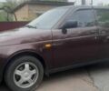 Красный ВАЗ 2170 Priora, объемом двигателя 1.6 л и пробегом 121 тыс. км за 3300 $, фото 1 на Automoto.ua