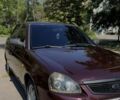 Красный ВАЗ 2170 Priora, объемом двигателя 1.6 л и пробегом 176 тыс. км за 3500 $, фото 1 на Automoto.ua