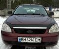 Красный ВАЗ 2170 Priora, объемом двигателя 1.6 л и пробегом 230 тыс. км за 2500 $, фото 1 на Automoto.ua