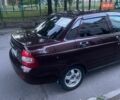 Красный ВАЗ 2170 Priora, объемом двигателя 1.6 л и пробегом 145 тыс. км за 2350 $, фото 1 на Automoto.ua