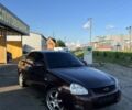 Красный ВАЗ 2170 Priora, объемом двигателя 1.6 л и пробегом 310 тыс. км за 2200 $, фото 1 на Automoto.ua