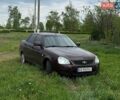 Красный ВАЗ 2170 Priora, объемом двигателя 1.6 л и пробегом 310 тыс. км за 2300 $, фото 1 на Automoto.ua