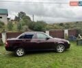 Красный ВАЗ 2170 Priora, объемом двигателя 1.6 л и пробегом 118 тыс. км за 4000 $, фото 1 на Automoto.ua