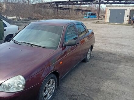 Красный ВАЗ 2170 Priora, объемом двигателя 1.6 л и пробегом 312 тыс. км за 2400 $, фото 1 на Automoto.ua