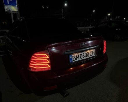 Красный ВАЗ 2170 Priora, объемом двигателя 1.6 л и пробегом 135 тыс. км за 3000 $, фото 1 на Automoto.ua