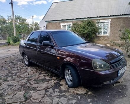 Красный ВАЗ 2170 Priora, объемом двигателя 1.6 л и пробегом 200 тыс. км за 1900 $, фото 1 на Automoto.ua