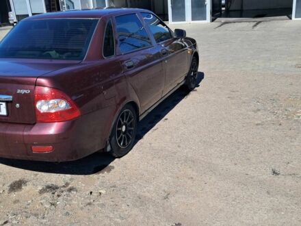 Красный ВАЗ 2170 Priora, объемом двигателя 1.6 л и пробегом 153 тыс. км за 2249 $, фото 1 на Automoto.ua