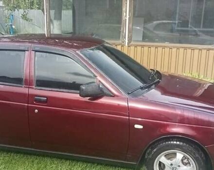 Красный ВАЗ 2170 Priora, объемом двигателя 1.6 л и пробегом 160 тыс. км за 2100 $, фото 1 на Automoto.ua