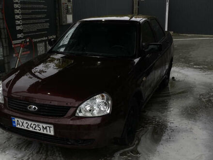 Красный ВАЗ 2170 Priora, объемом двигателя 1.6 л и пробегом 185 тыс. км за 2050 $, фото 1 на Automoto.ua