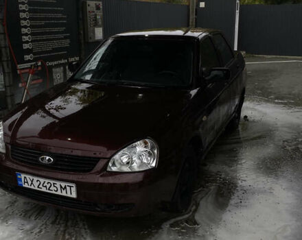 Красный ВАЗ 2170 Priora, объемом двигателя 1.6 л и пробегом 185 тыс. км за 2050 $, фото 1 на Automoto.ua