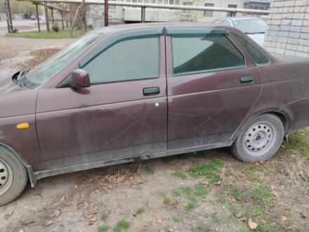 Красный ВАЗ 2170 Priora, объемом двигателя 1.6 л и пробегом 172 тыс. км за 1549 $, фото 1 на Automoto.ua