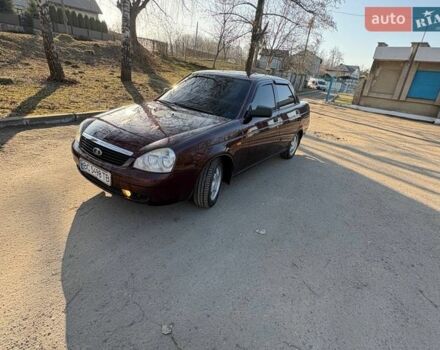Красный ВАЗ 2170 Priora, объемом двигателя 1.6 л и пробегом 310 тыс. км за 2100 $, фото 1 на Automoto.ua
