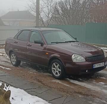 Красный ВАЗ 2170 Priora, объемом двигателя 1.6 л и пробегом 161 тыс. км за 2100 $, фото 1 на Automoto.ua