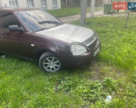 Красный ВАЗ 2170 Priora, объемом двигателя 1.6 л и пробегом 185 тыс. км за 2650 $, фото 1 на Automoto.ua