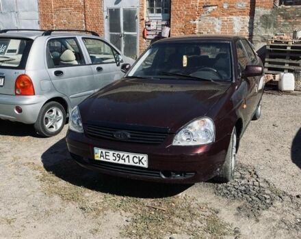 Красный ВАЗ 2170 Priora, объемом двигателя 1.6 л и пробегом 160 тыс. км за 1555 $, фото 1 на Automoto.ua
