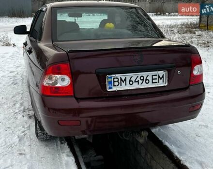 Красный ВАЗ 2170 Priora, объемом двигателя 1.6 л и пробегом 230 тыс. км за 2500 $, фото 1 на Automoto.ua