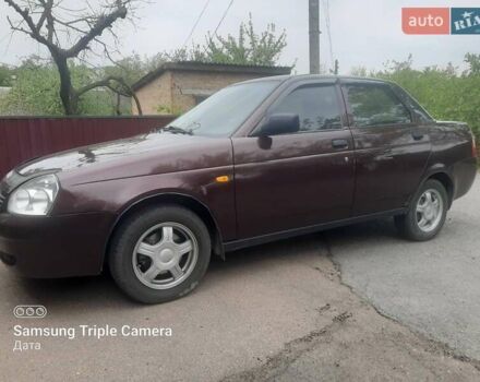 Красный ВАЗ 2170 Priora, объемом двигателя 1.6 л и пробегом 121 тыс. км за 4050 $, фото 1 на Automoto.ua
