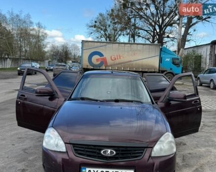 Красный ВАЗ 2170 Priora, объемом двигателя 1.6 л и пробегом 310 тыс. км за 2650 $, фото 1 на Automoto.ua