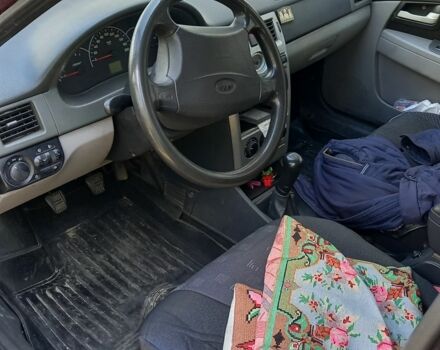 Красный ВАЗ 2171 Priora, объемом двигателя 1.6 л и пробегом 191 тыс. км за 1900 $, фото 11 на Automoto.ua