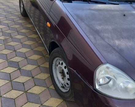 Красный ВАЗ 2171 Priora, объемом двигателя 1.6 л и пробегом 191 тыс. км за 1900 $, фото 2 на Automoto.ua