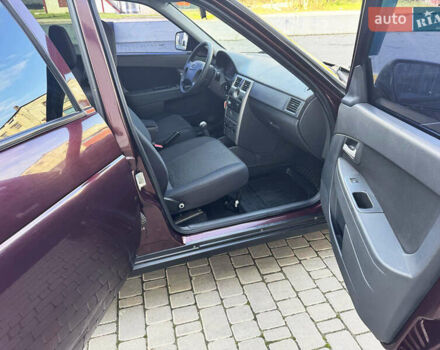 Красный ВАЗ 2171 Priora, объемом двигателя 1.6 л и пробегом 53 тыс. км за 4300 $, фото 12 на Automoto.ua