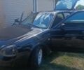 Черный ВАЗ 2172 Priora, объемом двигателя 1.6 л и пробегом 210 тыс. км за 1346 $, фото 1 на Automoto.ua